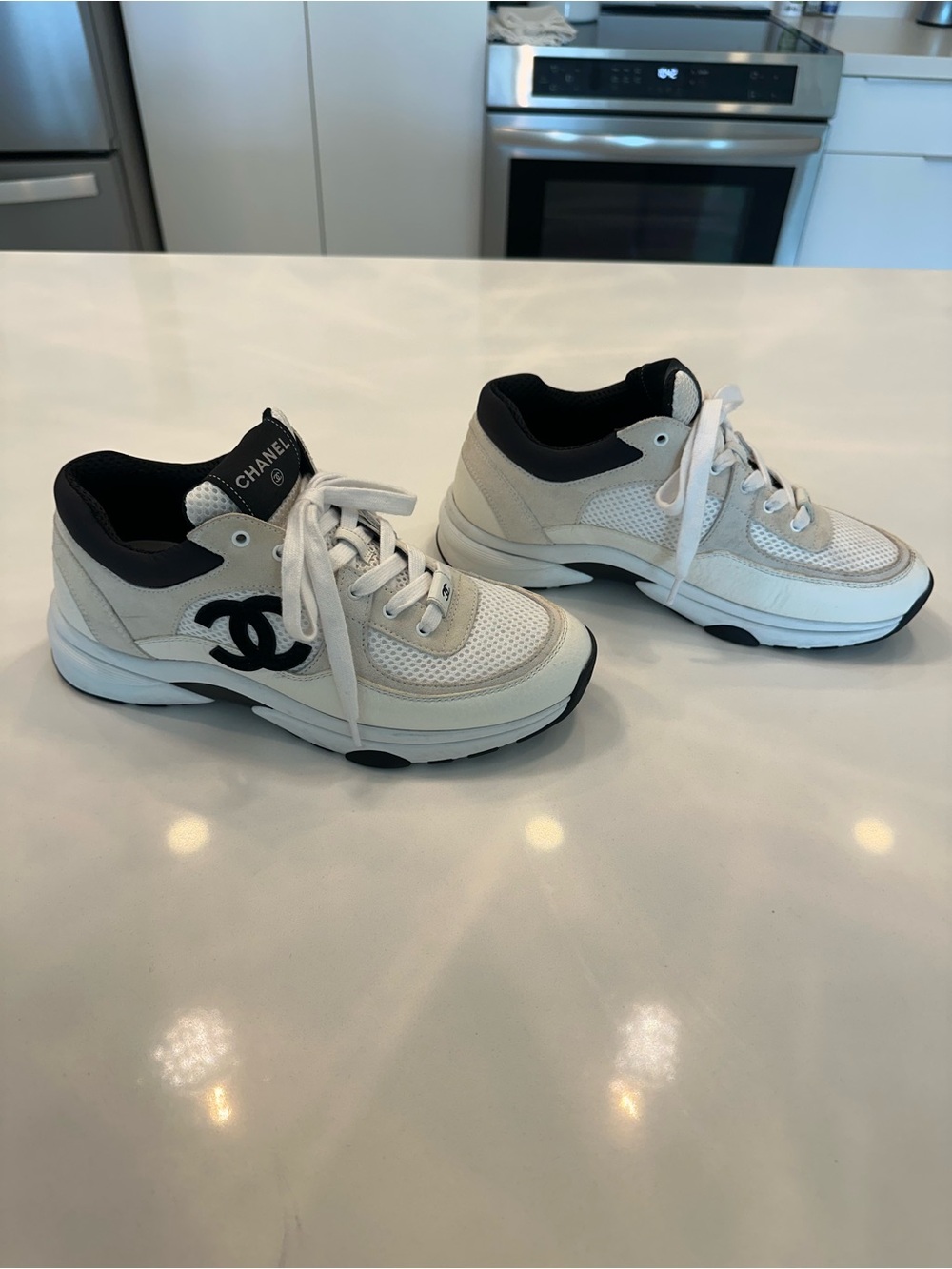 CHANEL White and Black Sneakers